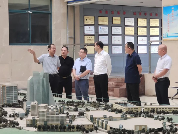 四川省广元市经济合作和表事局到集团调查互换